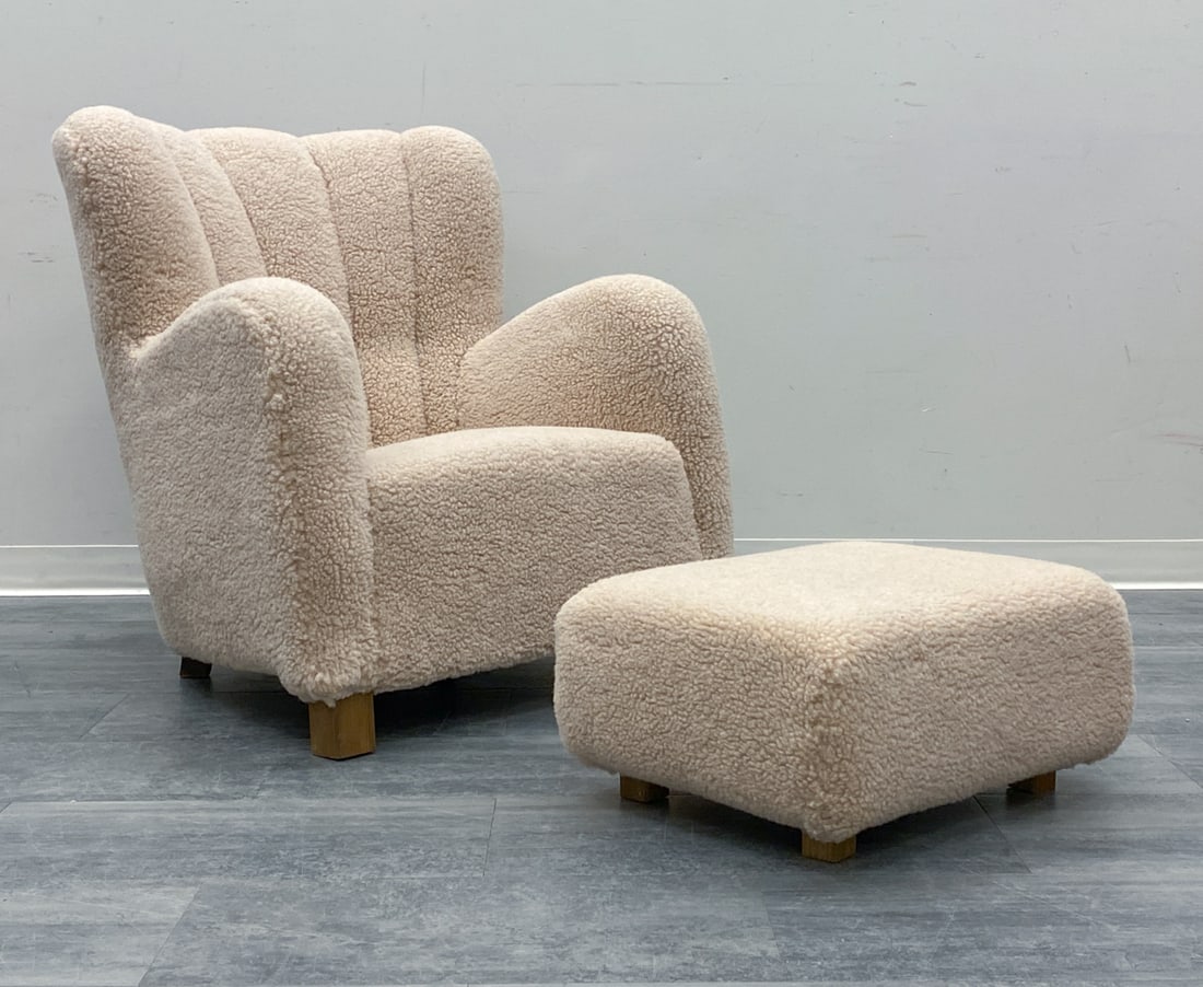FLEMMING LASSEN STYLE LAMBSWOOL CHAIR & OTTOMAN: Lambswool upholstery and oak legs. With matching ottoman. Denmark, circa 1940s. Dimensions: H 36" x W 32" x D 28" x SH 16" (Ottoman. ) H 11" x W 23" x D 19" Condition: Recently Reupholstered, Wear con
