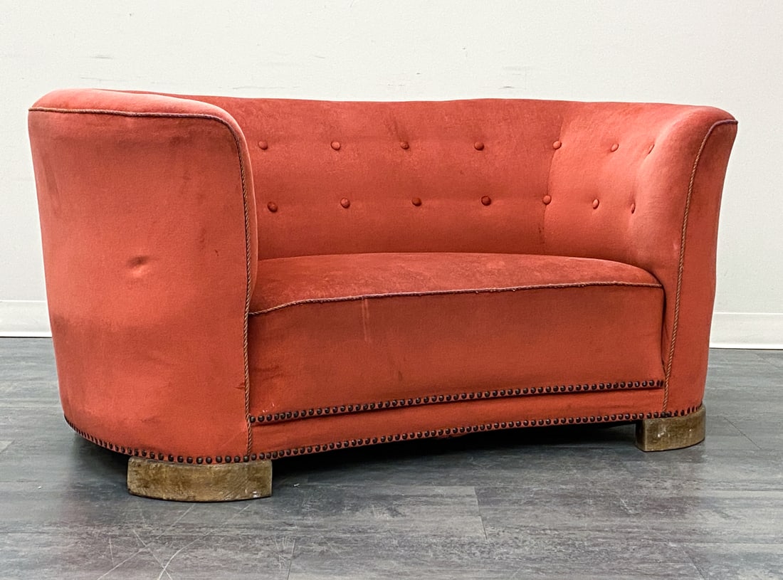 VIGGO BOESEN FOR SLAGELSE DANISH BANANA SOFA 1940S: Tufted backrest, velour upholstery and oak legs. Apparently unmarked. Denmark, circa 1940s. Dimensions: H 27" x W 57" x D 23" x SH 15" Condition: Wear consistent with age and use. Fading, indentations