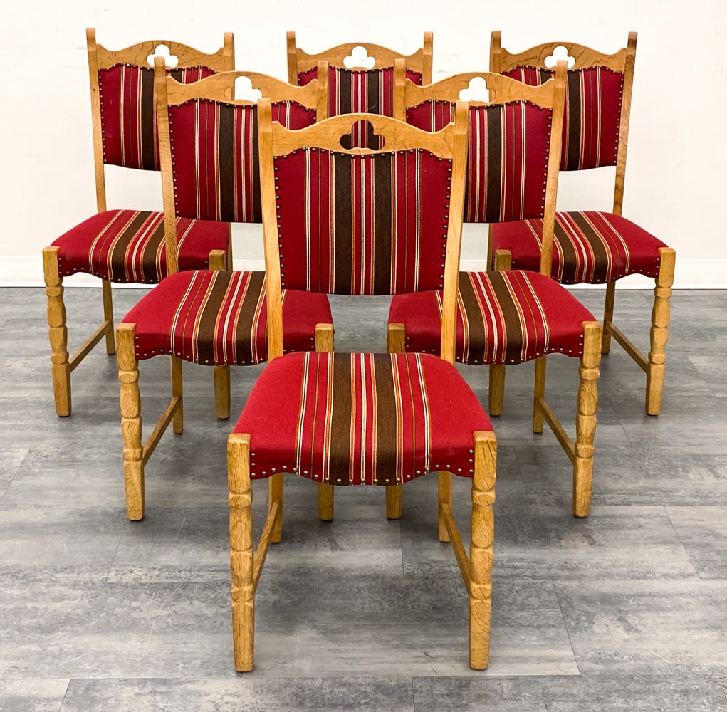 (6) KJAERNULF STYLE DANISH OAK DINING CHAIRS 1970S: Carved oak frame and striped upholstery. Denmark, circa 1970s. Dimensions: H 34" x W 18" x D 18" x SH 17" Condition: Wear consistent with age and use. Scuffs, fading, some discoloration.