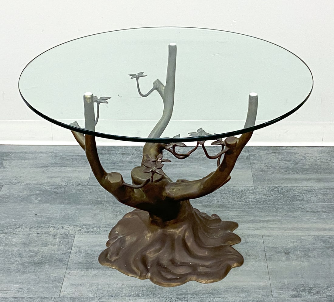 ATTR WILLY DARO BELGIAN BRASS BONSAI TABLE: Features a brass bonsai tree base with a sculptural root and branch structure with leaf accents. Round glass top. Apparently unmarked. Belgium, circa 1970s. Dimensions: H 23.5" x Dia 32" Condition: We