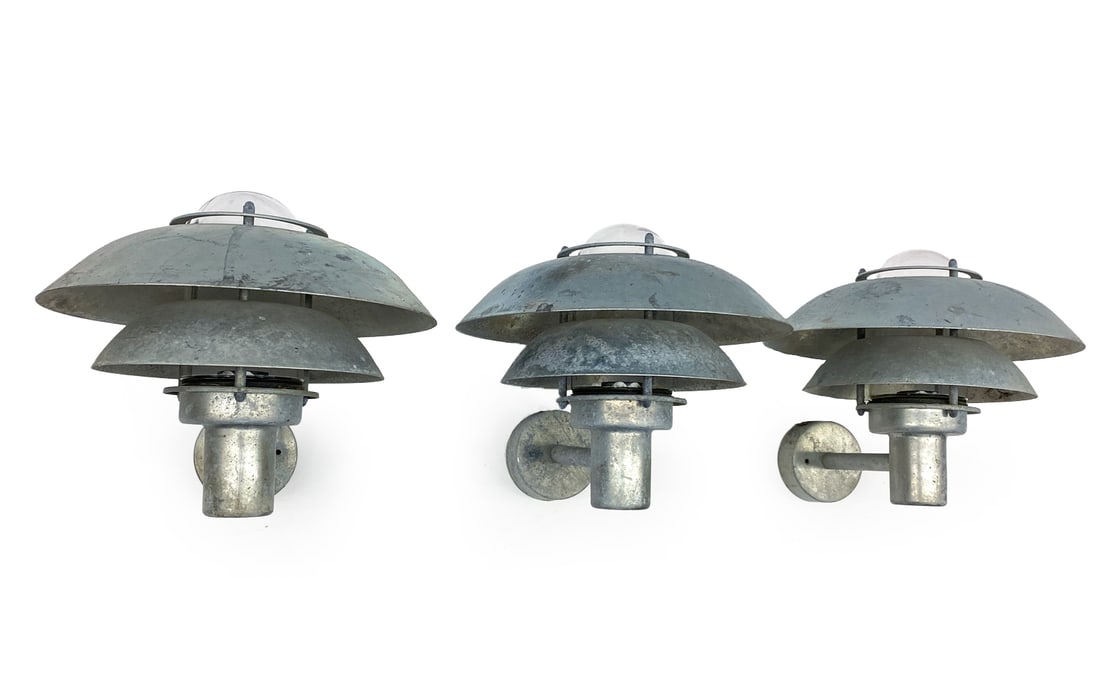MARKSLOJD SWEDISH GALVANIZED STEEL WALL SCONCES: (3) Marked to mount. Galvanized sconces with tiered saucer shapes. Sweden, 20th century. Dimensions: H 13" x W 12" x D 11" Condition: Wear consistent with age and use. Oxidizing, soiling, Untested.