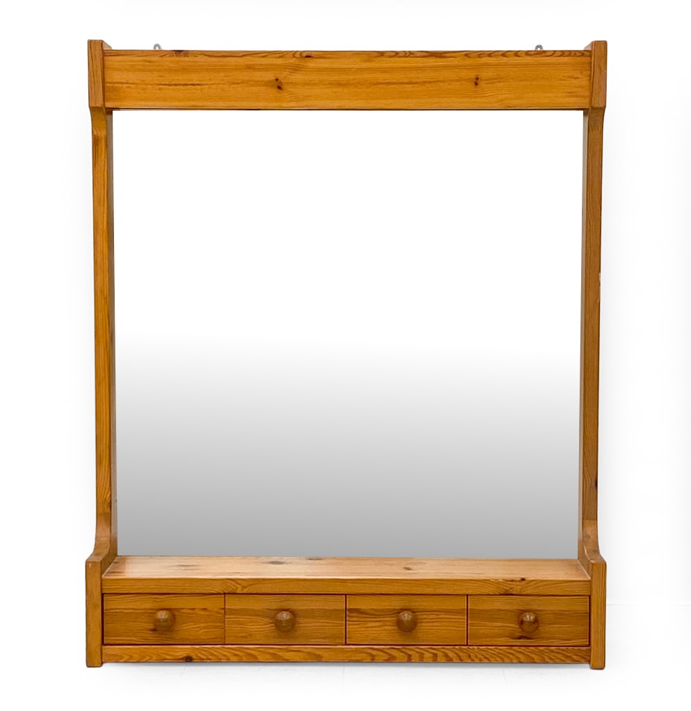 SWEDISH PINE VANITY WALL MIRROR C. 1960S: Hanging vanity mirror with 4 drawers and shelf to bottom. Sweden, circa 1960s. Dimensions: H 47.25" x W 29.25" x D 10" Condition: Wear consistent with age and use. Wiring untested. Cord cut. Scuffs,