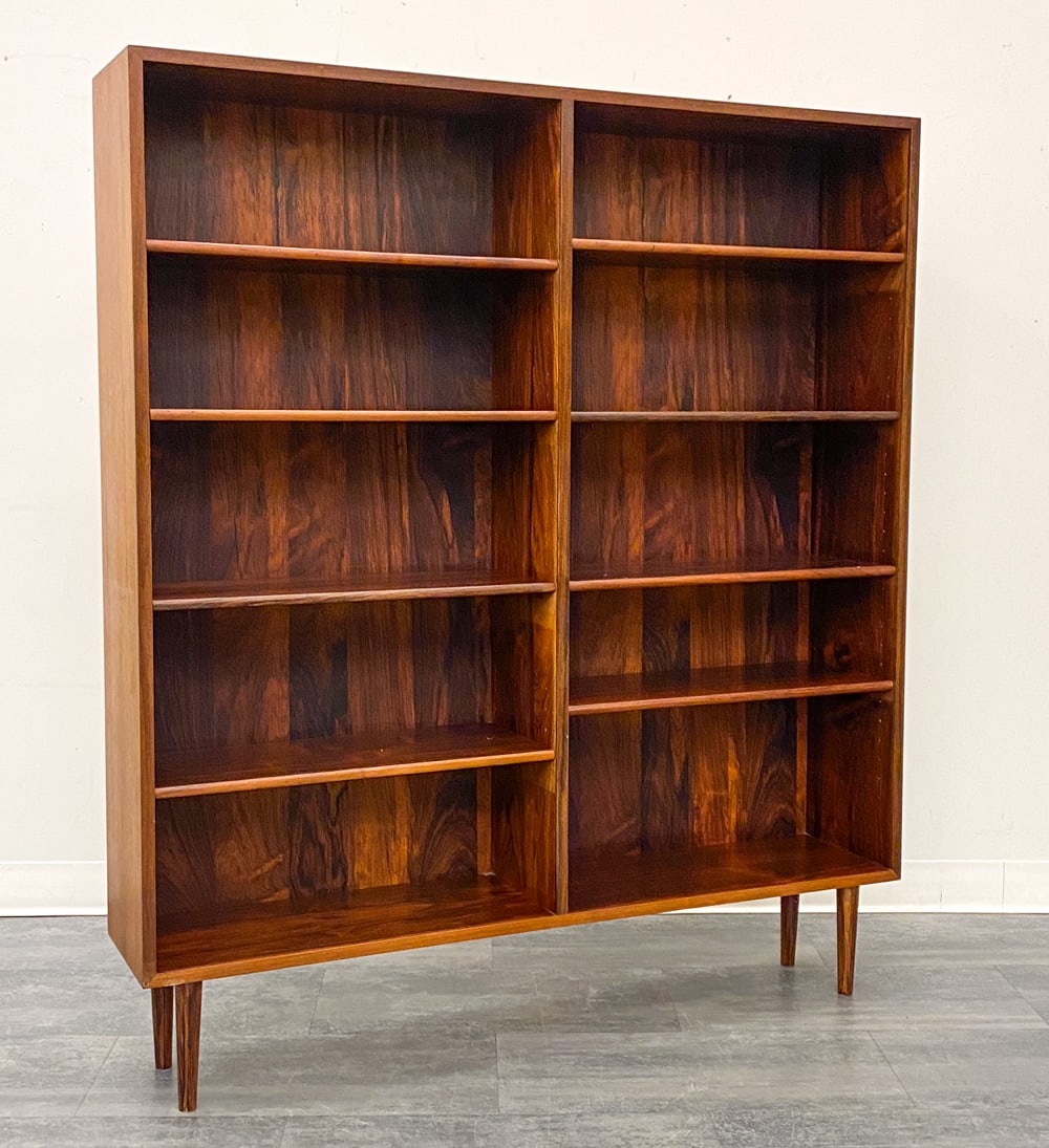ATTR POUL HUNDEVAD DANISH ROSEWOOD BOOKCASE: Apparently unmarked. Denmark, circa 1960s. Dimensions: H 59" x W 51.25" x D 10.25" Condition: Wear consistent with age and use. Scuffs, fading, nicks to legs.