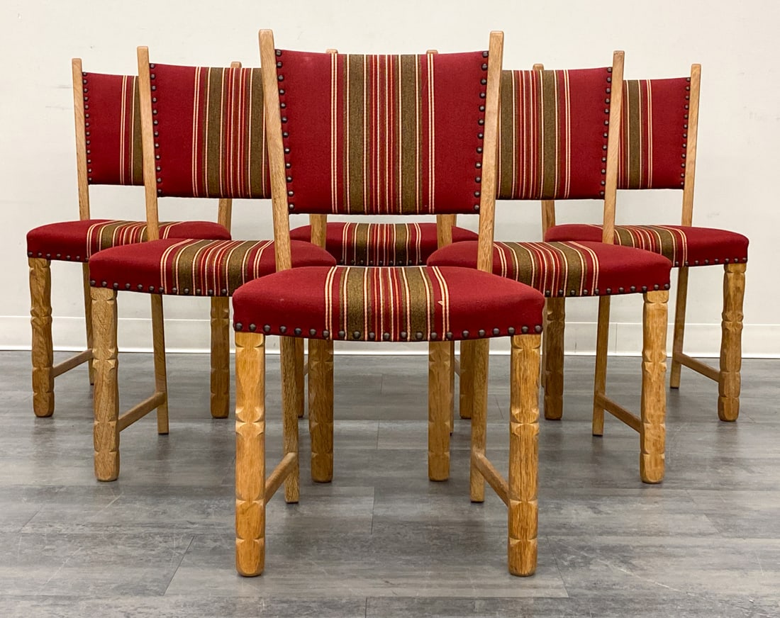 6 ATTR HENNING KJAERNULF DANISH OAK DINING CHAIRS: Carved oak frame and striped upholstery. Denmark, circa 1970s. Dimensions: H 34" x W 18" x D 18" x SH 17" Condition: Wear consistent with age and use. Scuffs, fading, light soiling spots.