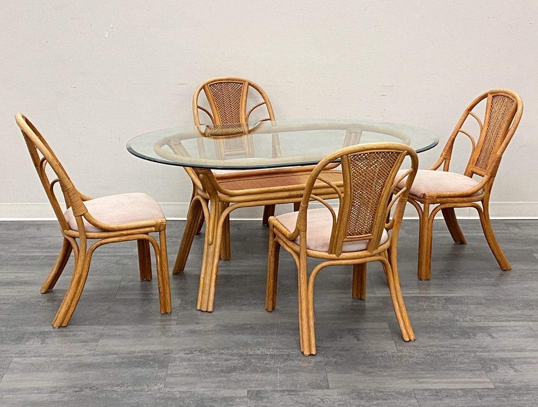 (4) SCANDINAVIAN BAMBOO & RATTAN CHAIRS & TABLE: Four lounge chairs and glass top table in bamboo and rattan frame. Featuring light pink seats. Scandinavian, 20th century. Dimensions: (Chairs) H 34.25" x W 18.25" x D 23" x SH 18.5" (Table) H 28" x W
