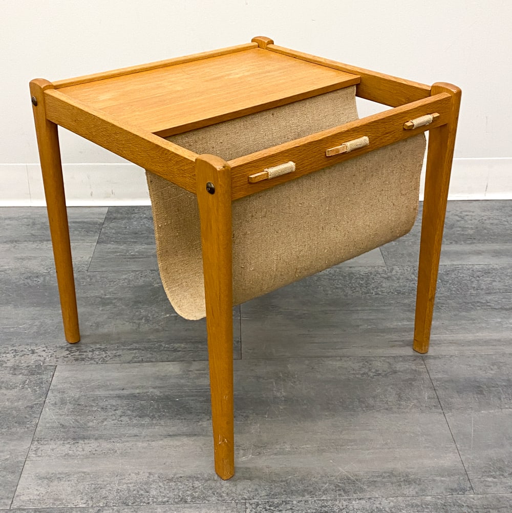BRDR FURBO DANISH TEAK MAGAZINE RACK 1960S: Marked to underside. Canvas sling and teak frame. Dimensions: H 18.5" x W 17.75" x D 17.75" Condition: Wear consistent with age and use. Fading, watermarks, scuffs.