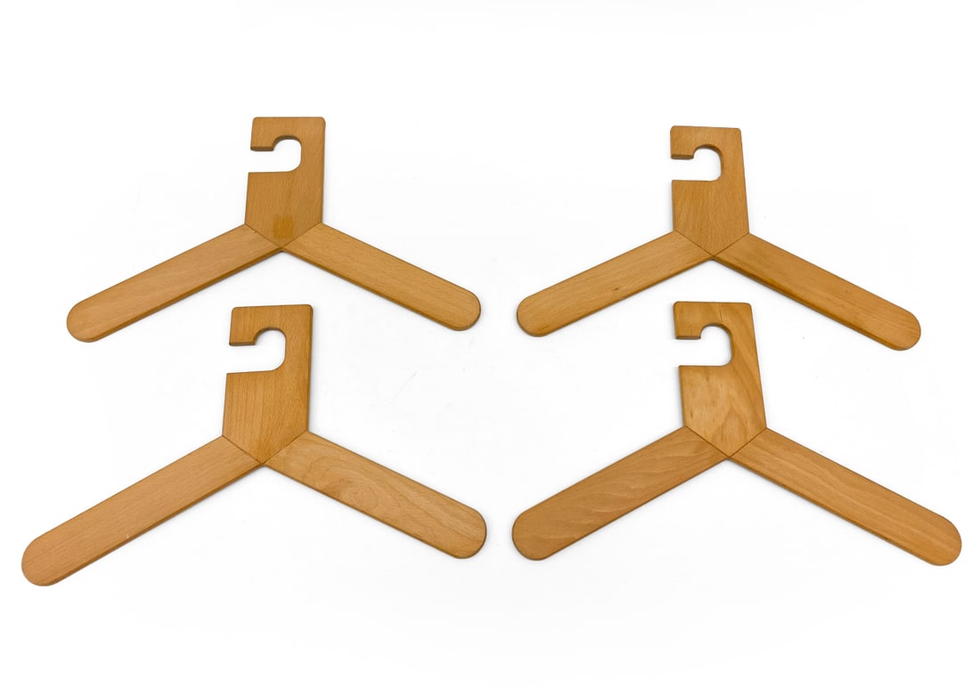 ATTR. SVEN LARSSON SWEDISH BEECH HANGERS GROUPING: (4) Hangers. Apparently unmarked. Sweden, circa 1970s. Dimensions: H 13" x W 18" Condition: Wear consistent with age and use. Some scuffs.