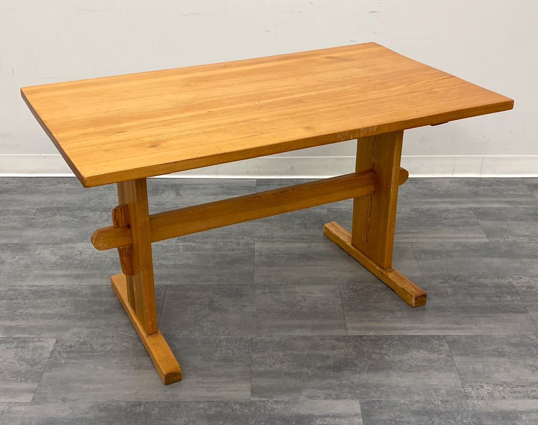 BRUTALIST DANISH PINE DINING TABLE C. 1960S: Trestle base dining table. Denmark, circa 1960s. Dimensions: H 28.5" x W 50.75" x D 29.75" Condition: Wear consistent with age and use. Soiling, fading, discoloration, watermarks, scratches.