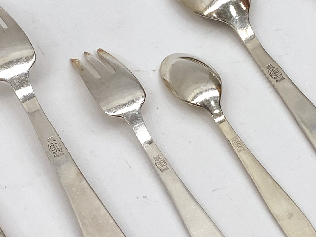 JENS H. QUISTGAARD SILVERPLATE FLATWARE GROUPING - 12