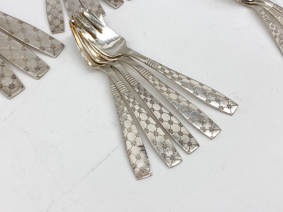 JENS H. QUISTGAARD SILVERPLATE FLATWARE GROUPING - 4