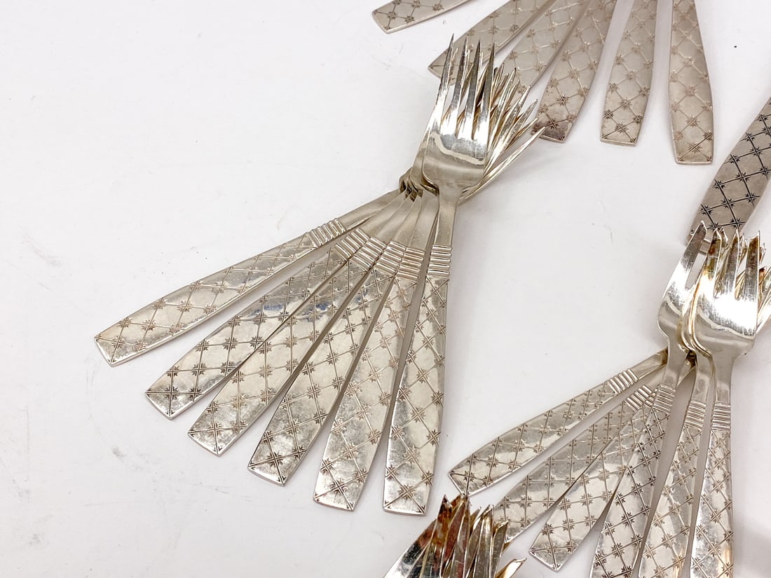 JENS H. QUISTGAARD SILVERPLATE FLATWARE GROUPING - 9