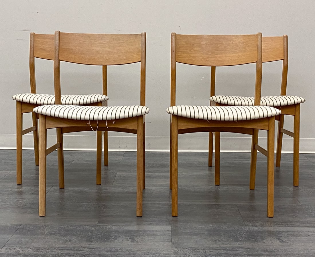 (4) FARSO STOLEFABRIK DANISH OAK DINING CHAIRS: Oak frame and striped upholstered seat. Apparently unmarked. Denmark, circa 1960s. Dimensions: H 31.5" x W 19.25" x D 18.5" x SH 17.5" Condition: Wear consistent with age and use. Some soiling spots,