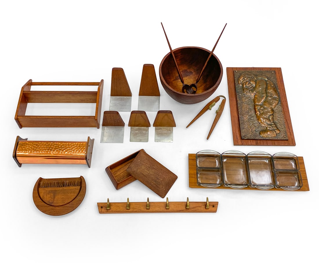 DANISH TEAK TABLEWARE & HOME ACCESSORIES GROUPING: (17) items including: bookends, bowl, flatware, spices bowls and more. Denmark, circa 1960s. Dimensions: (Largest) H 15" x W 9" Condition: Wear consistent with age and use. Scuffs, minor rubs.
