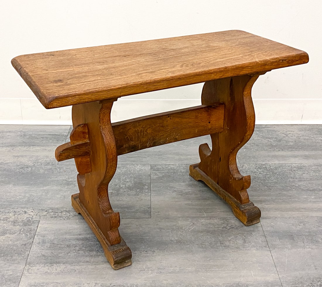 KJAERNULF STYLE DANISH OAK SIDE TABLE C. 1970S: Rustic trestle base side table or a bench. Denmark, circa 1970s. Dimensions: H 19.25" x W 28.25" x D 11.75" Condition: Wear consistent with age and use. Discoloration, minor soiling spots,