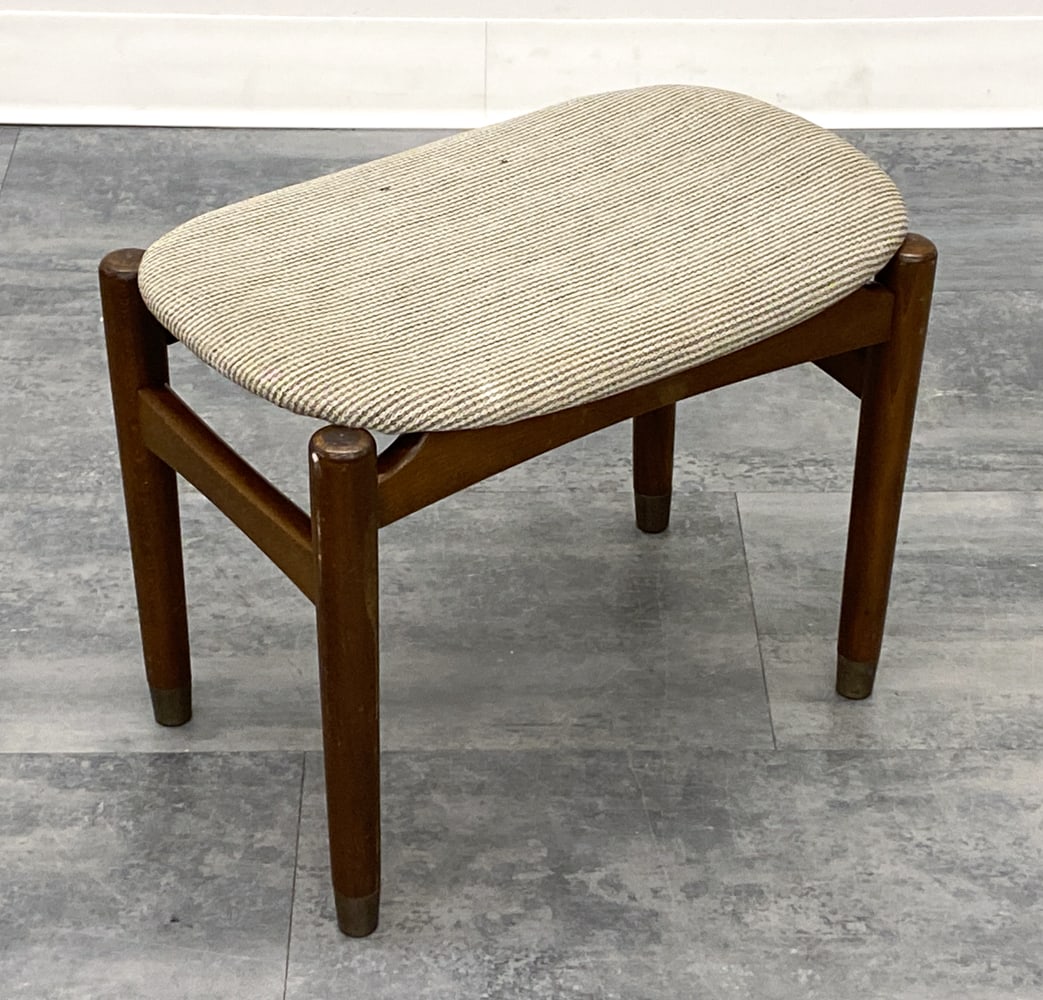 SOREN HANSEN STYLE DANISH OTTOMAN C. 1960S: Stained beech frame. Denmark, circa 1960s. Dimensions: H 14" x W 18.25" x D 12.5" Condition: Wear consistent with age and use. Soiling spots, fading, discoloration, scuffs, nicks.