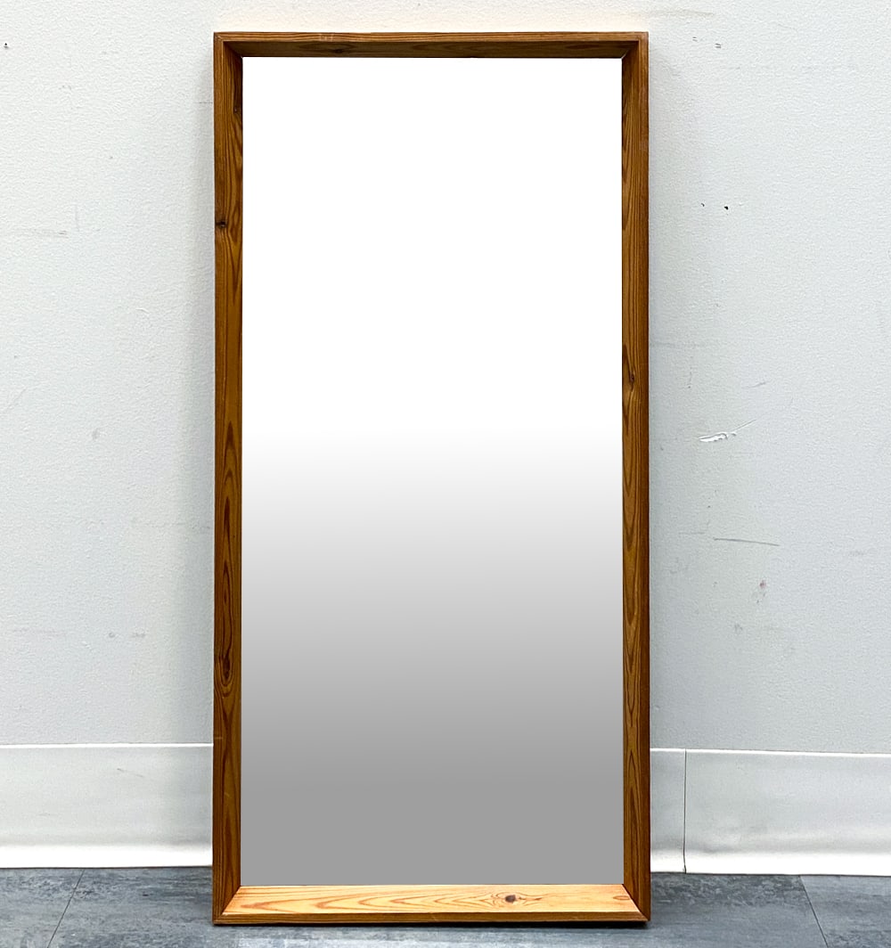 SCANDINAVIAN PINE WALL MIRROR C. 1960S: Dimensions: H 29" x W 14.25" Condition: Wear consistent with age and use. Scuffs to frame.