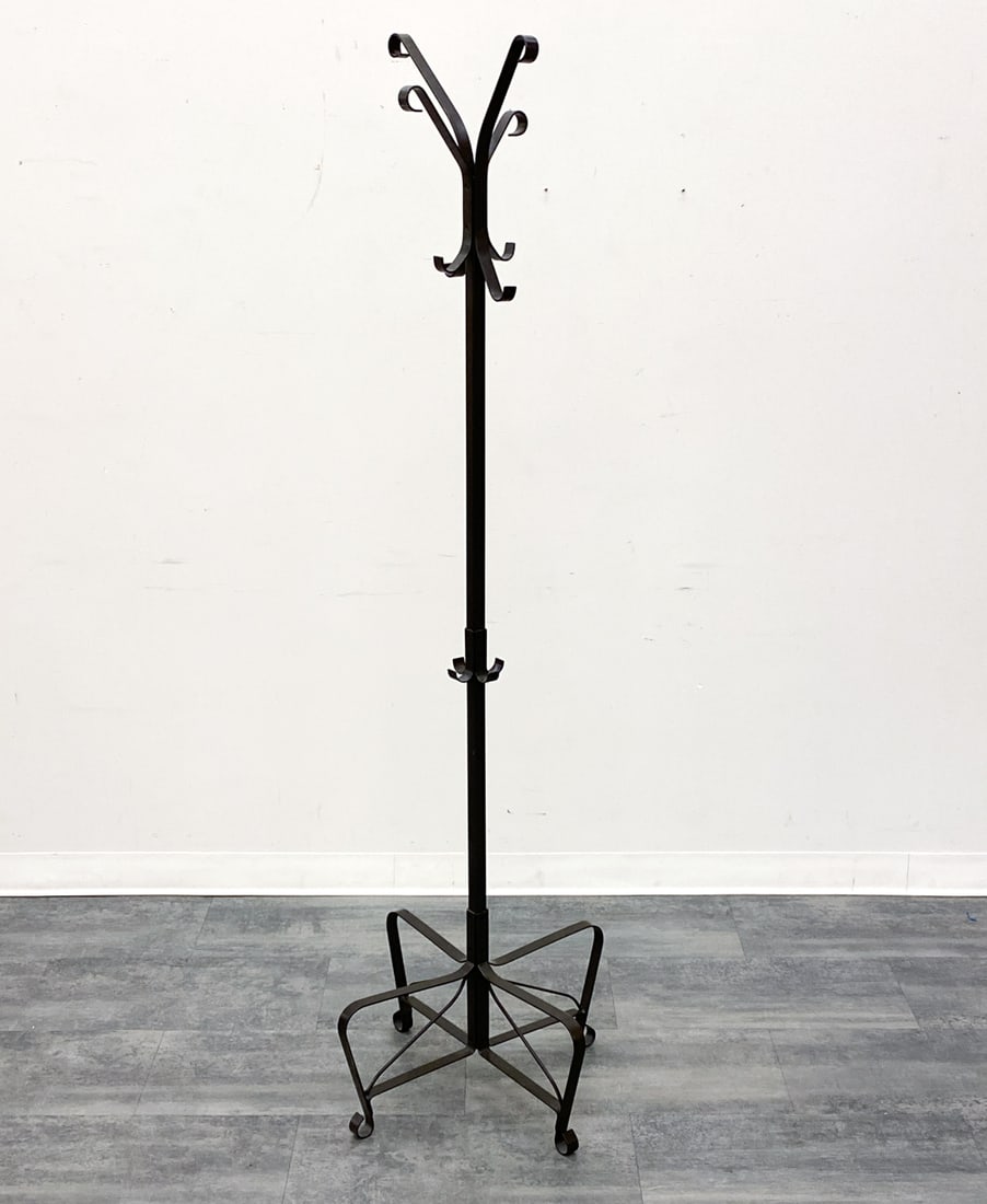 SCANDINAVIAN IRON COAT RACK C. 1970S: Dimensions: H 74.75" x Dia 23" Condition: Wear consistent with age and use. Light scuffs, minor soiling.