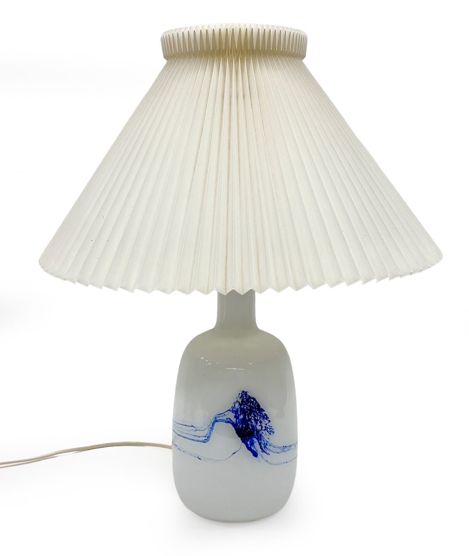 LE KLINT DANISH GLASS TABLE LAMP C. 1960S: Marked underneath. Glass table lamp with pleated shade. Denmark, circa 1960s. Dimensions: H 22" x D 18" Condition: Wear consistent with age and use. Wiring untested, cord cut.
