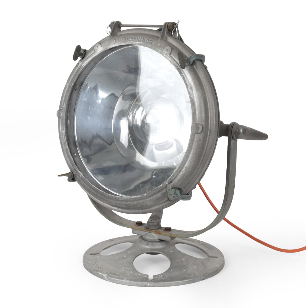 CROUSE HINDS CAST ALUMINUM SPOTLIGHT C. 1930S: Crouse Hinds "ADR 14" spotlight. Marked on base. Circa 1930s. Dimensions: H 22.5" x Dia. 18" Condition: Losses to paint. Oxidation to metal. Marks to lens. Wiring untested. Wear consistent with age