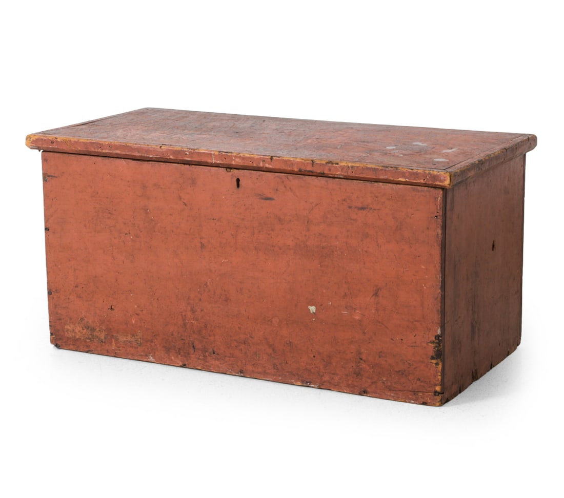 ANTIQUE EARLY 19TH C. PINE SIX BOARD BLANKET CHEST: Pine six board blanket chest with red paint and iron hardware. 19th century. Dimensions:H 18'' x W 35.5'' x D 17'' Condition: Musty Odor. Key not included. Discoloration, stains, scratches and scuffs 