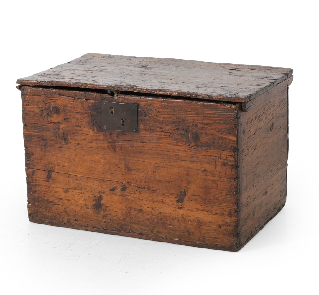 ANTIQUE 19TH C. WOODEN TRUNK: Rustic oak with iron hinges and lock. No key included. Lined with newspaper. 19th century Dimensions: H 16" x W 26" x D 16" Condition: Showing signs of wear consistent with age and use, scuffs , scrat