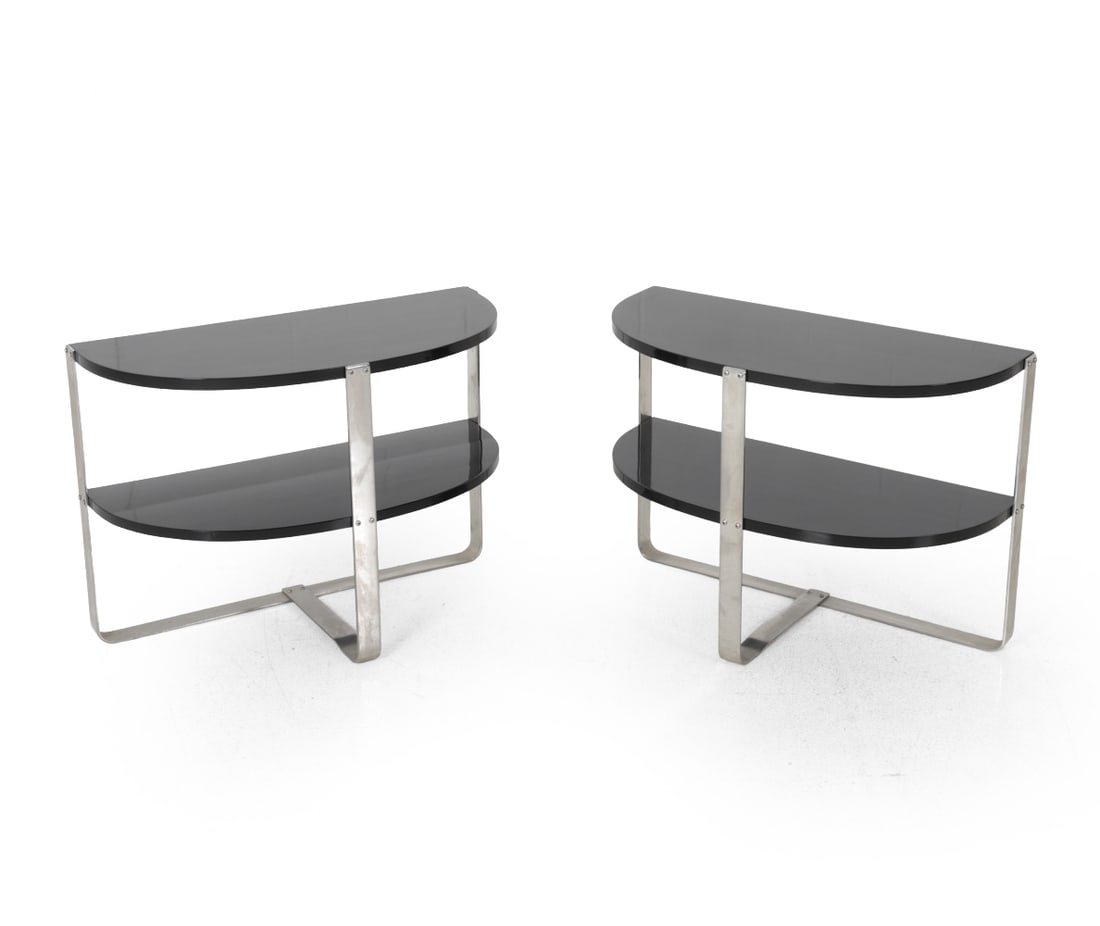 PAIR WOLFGANG HOFFMANN STYLE CHROME SIDE TABLES: Chrome base with black lacquered wooden top. Circa 1930s. Provenance: Originally purchased at Glen LeRoux Collections in 1997 for $3,000. Dimensions: H 23'' x W 31'' x D 14'' Condition: Wear