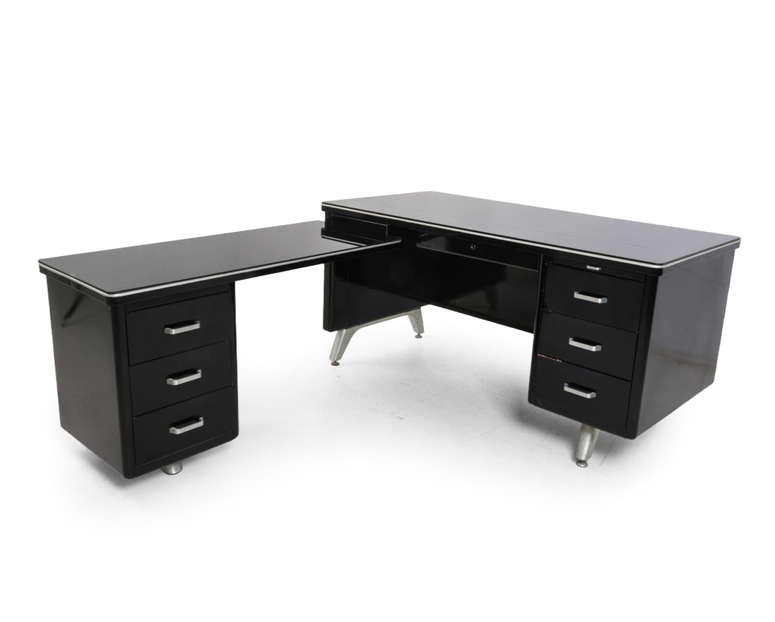 ART DECO STATESMAN L-SHAPED TANKER DESK 1940S: Marked to surface. Industrial black steel tanker desk with a matching side return. Glass top. circa 1940s. Provenance: Originally purchased at Depression Modern in 1999 for $1,250. Dimensions: (Talles