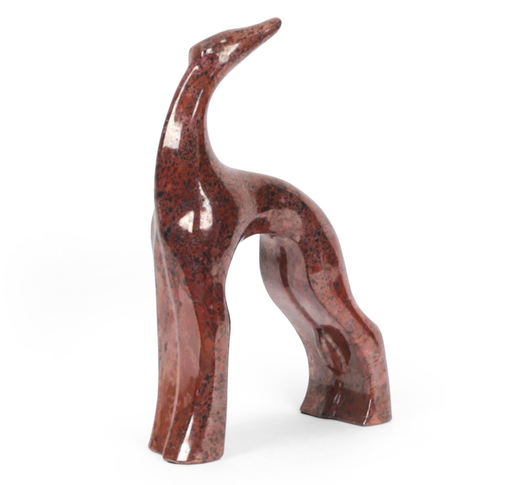 ART DECO STYLE ROYAL HAEGER PORCELAIN WHIPPET: Speckled burgundy finished porcelain. Apparently unmarked. 20th century. Dimensions: H 22" x W 15" x D 5.5" Condition: With light handling marks consistent with age.