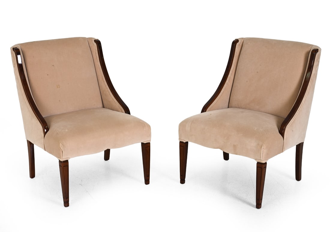 PAIR ART DECO 1940S VELOUR SQUARE BACK ARMCHAIRS: Art deco style armchairs in walnut frame with carved legs and velour upholstery. 20th century. Provenance: Originally purchased at Depression Modern in 2006 for $1,600. Dimensions: H 34" x W 25" x D 2