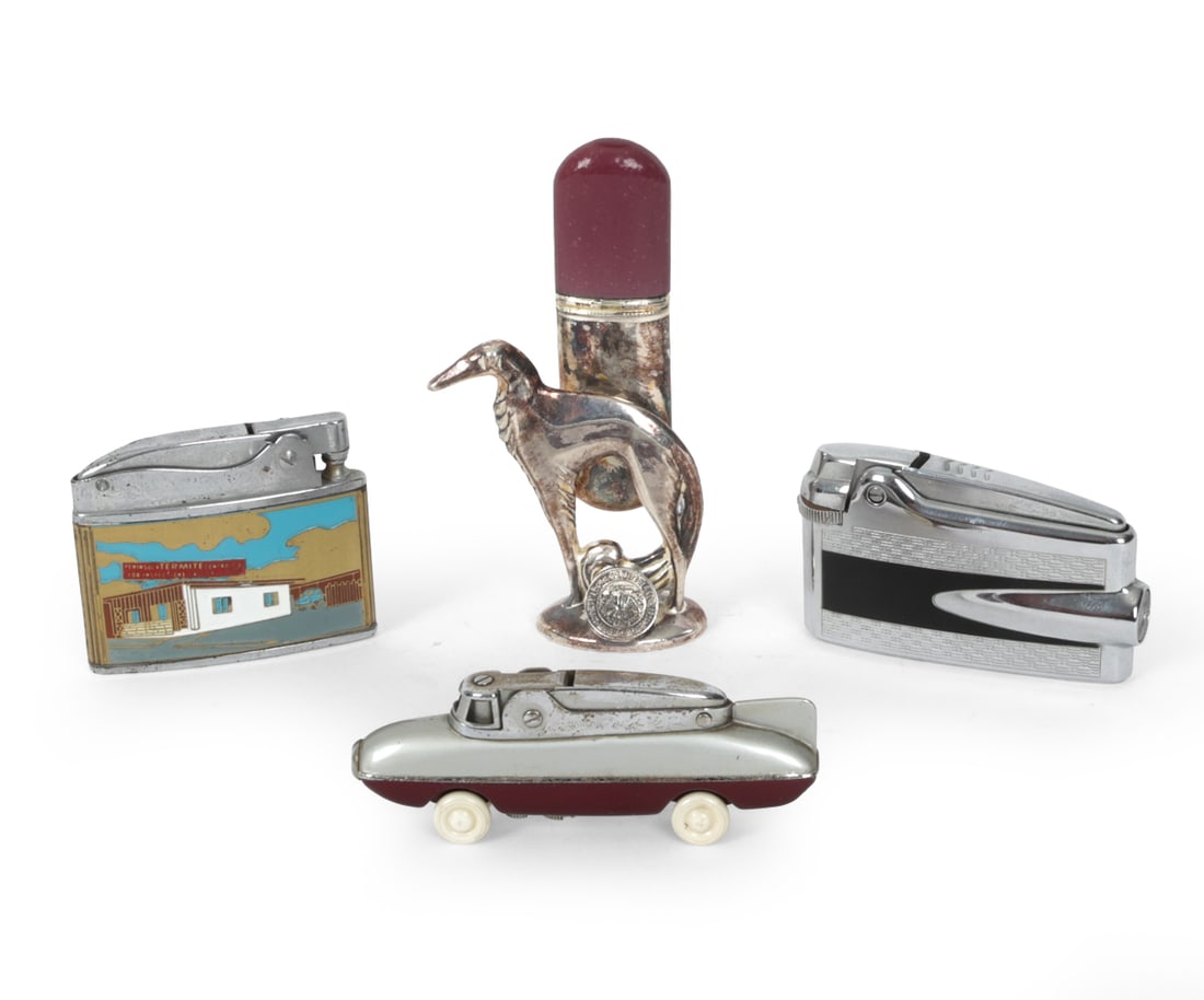 ART DECO CIGARETTE LIGHTERS GROUPING INCL. BALBOA: (4) Lighters including: Wellington Balboa, Sarome, Varaflame, and a silver plate automobile club of America lighter. All marked to bottom. Dimensions: (Largest) H 4.25" x W 1" Condition: Patina throug