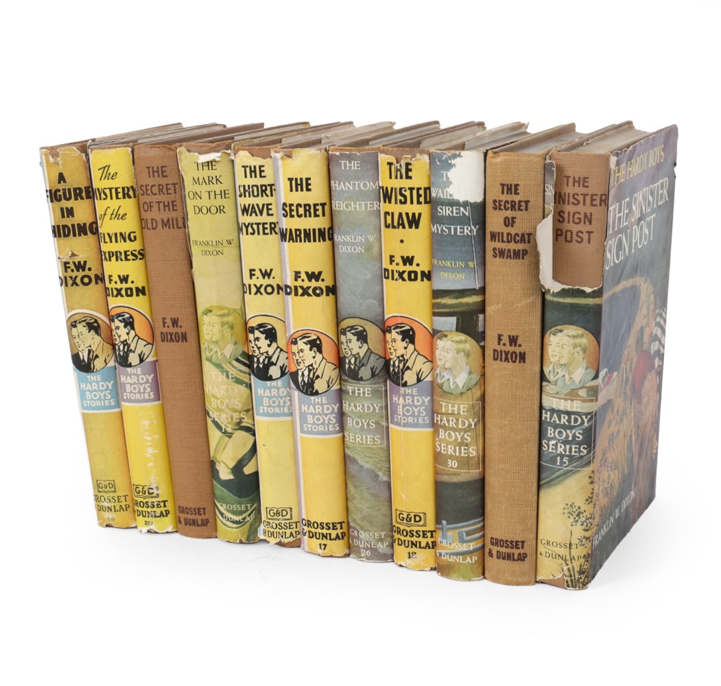 THE HARDY BOYS MYSTERY STORIES BOOKS C. 1950S: (11) By Franklin W. Dixon and published by Grosset & Dunlap. In original pictorial dust jackets from the 1950s. Dimensions: H 10" x W 7.5" x D 5.25" Condition: Scuffs and tears on covers, wear of fini