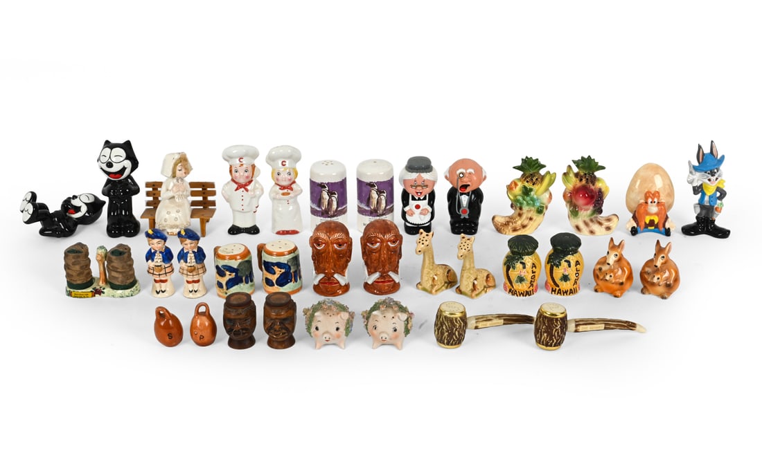 SALT & PEPPER SHAKER GROUPING: (35) Items. Includes kangaroos, Looney Toons, Felix the Cat, and other miscellaneous characters and designs. Wood, plastic and porcelain. Giraffes are marked "Japan" underneath. Dimensions: (Largest) 