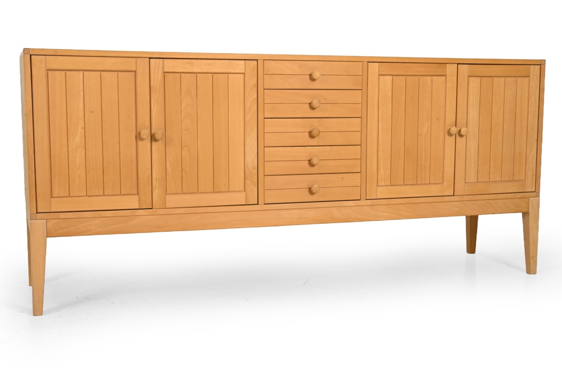 GUNNAR FALSIG BEECH SIDEBOARD C.1970S: Gunnar Falsig for Falsig Mobelfabrik. Beech with slatted cabinet front, center drawers, and tapered legs. Interior storage. Denmark, circa 1970s. Dimensions: H 34.5'' x W 78'' x D 20" Condition: Scuff