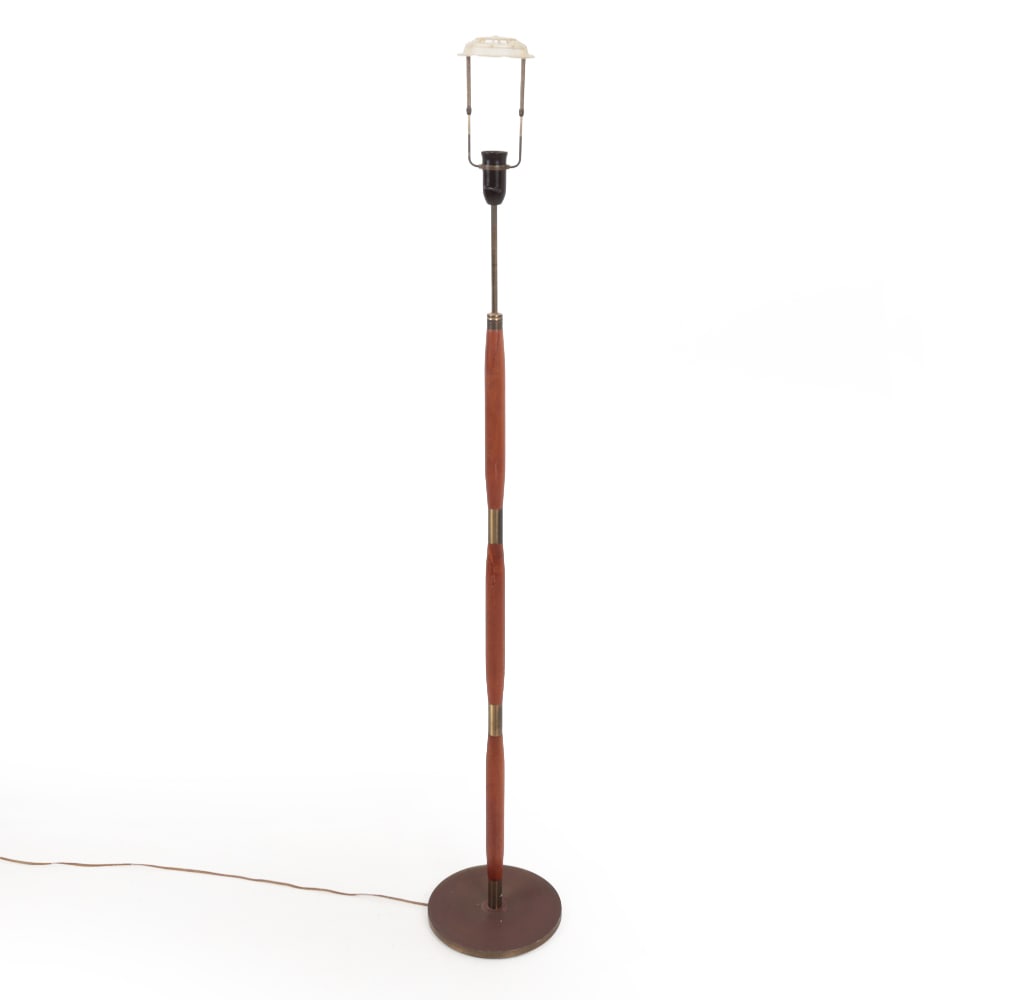 DANISH TEAK & BRASS FLOOR LAMP C. 1960S.: Adjustable teak floor lamp with brass accents and base. Danish. Circa 1960s. Dimensions: (Tallest) H 66" x W 9.75" Condition: Tarnish to brass. Discoloration to wood. European plug. Wiring untested.