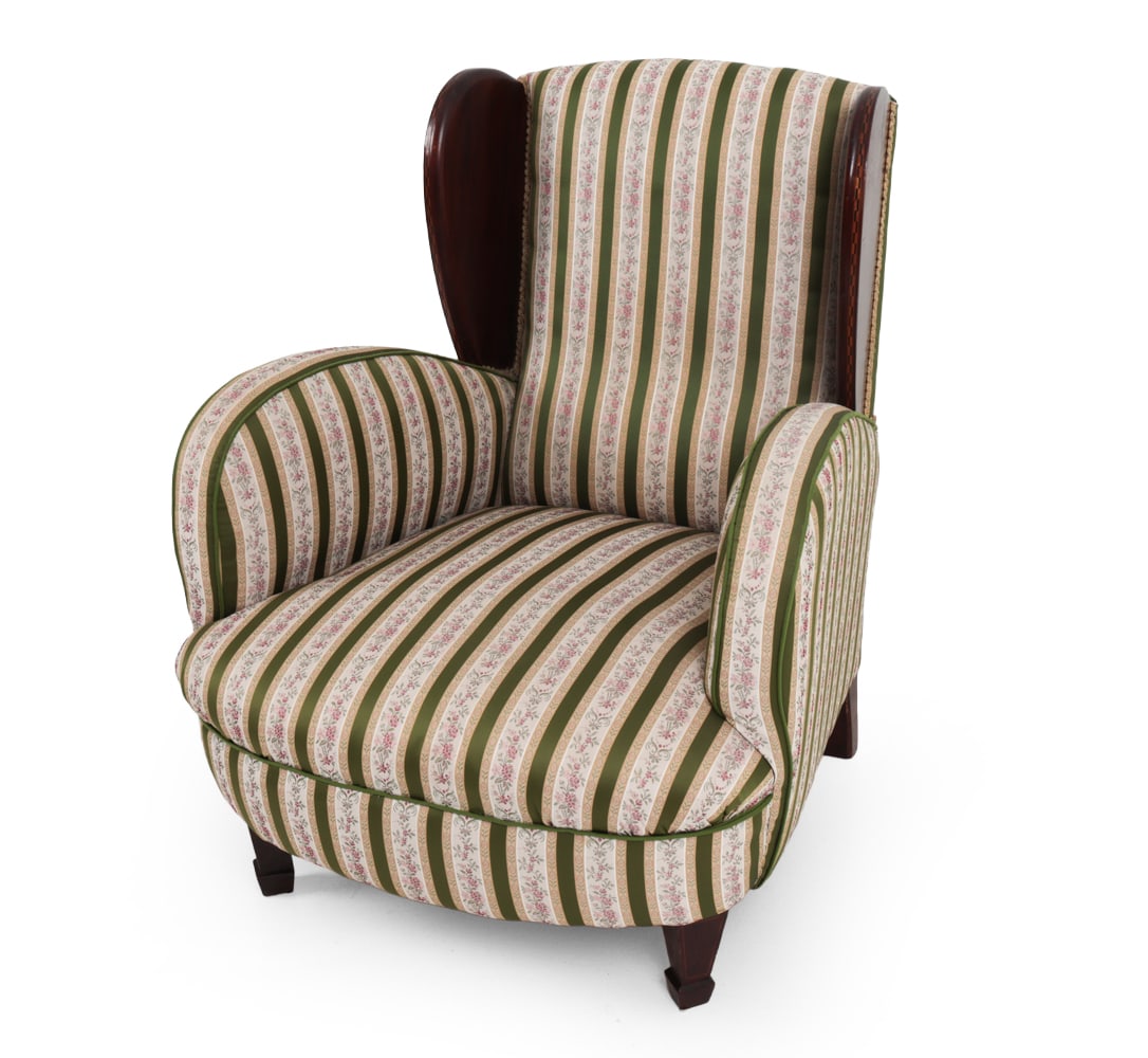 SCANDINAVIAN MAHOGANY WINGBACK LOUNGE CHAIR: Lounge chair in green stripe floral upholstery and mahogany wingback with inlays to edge. Scandinavian, 20th century. Dimensions: H 36'' x W 29.8'' x D 34" x SH 16" Condition: A few scuffs to wood, li