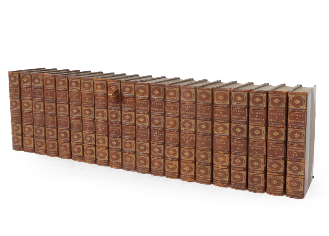 GEORGE W. M. REYNOLDS'S WORKS OXFORD VOLUME SET: (20) leather bound works by George W. M. Reynolds(1814-1879) (The Mysteries of the Court of London) Volumes "Connoisseur" Edition. Dimensions: H 9" x W 6.25" x D 1.75" Condition: Edge wear to spine