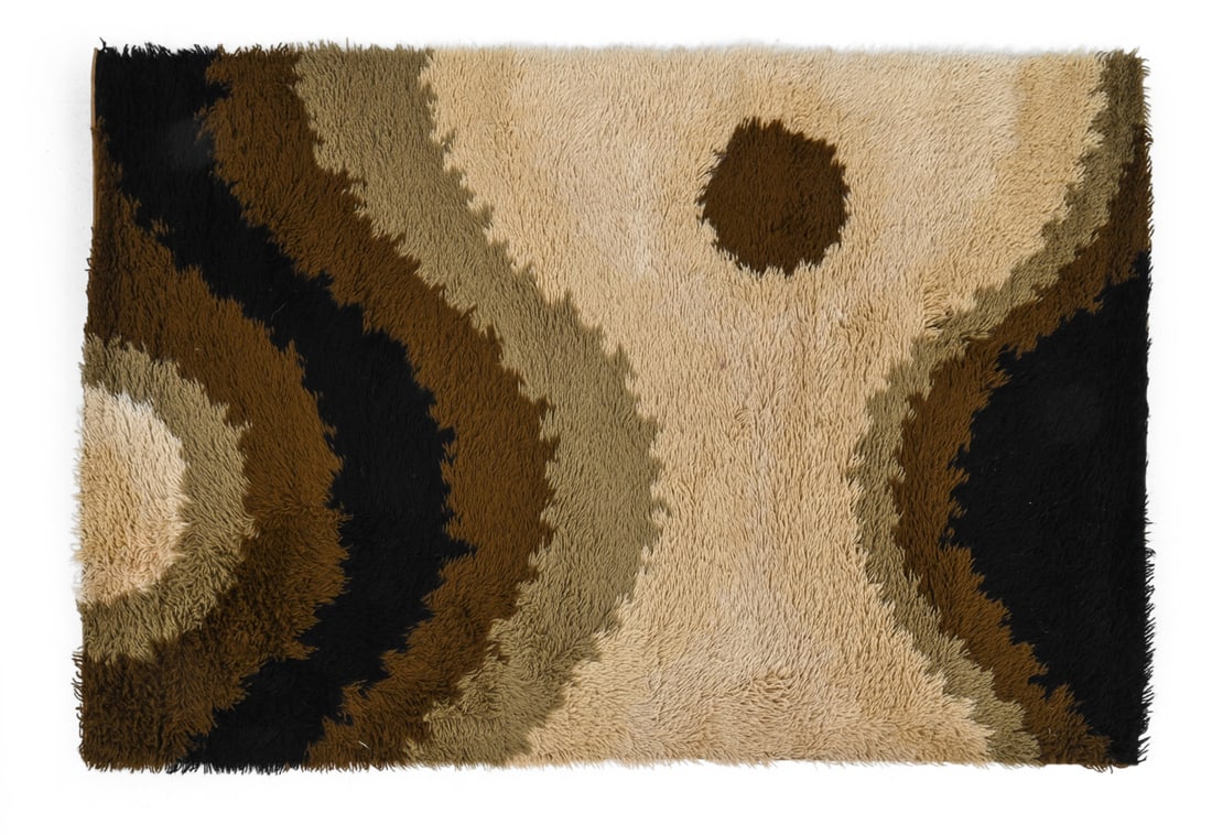 SCANDINAVIAN GEOMETRIC RYA SHAG RUG C. 1970S: Wool with geometric pattern in brown tone. Scandinavian, circa 1970s. Dimensions: L 71" x W 49" Condition: Discoloration and staining. Wear consistent with age and use.