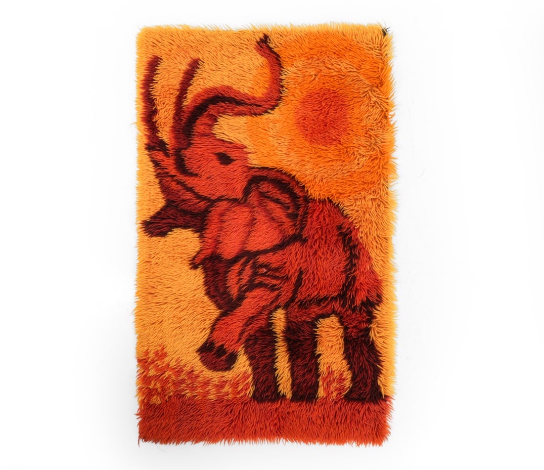 DANISH EGE WOOL RYA RUG C. 1970S: Wool with vibrant elephant motif. Denmark, circa 1970s. Dimensions: H 44" x W 27" Condition: Wear consistent with age and use. Minor fraying at corners.