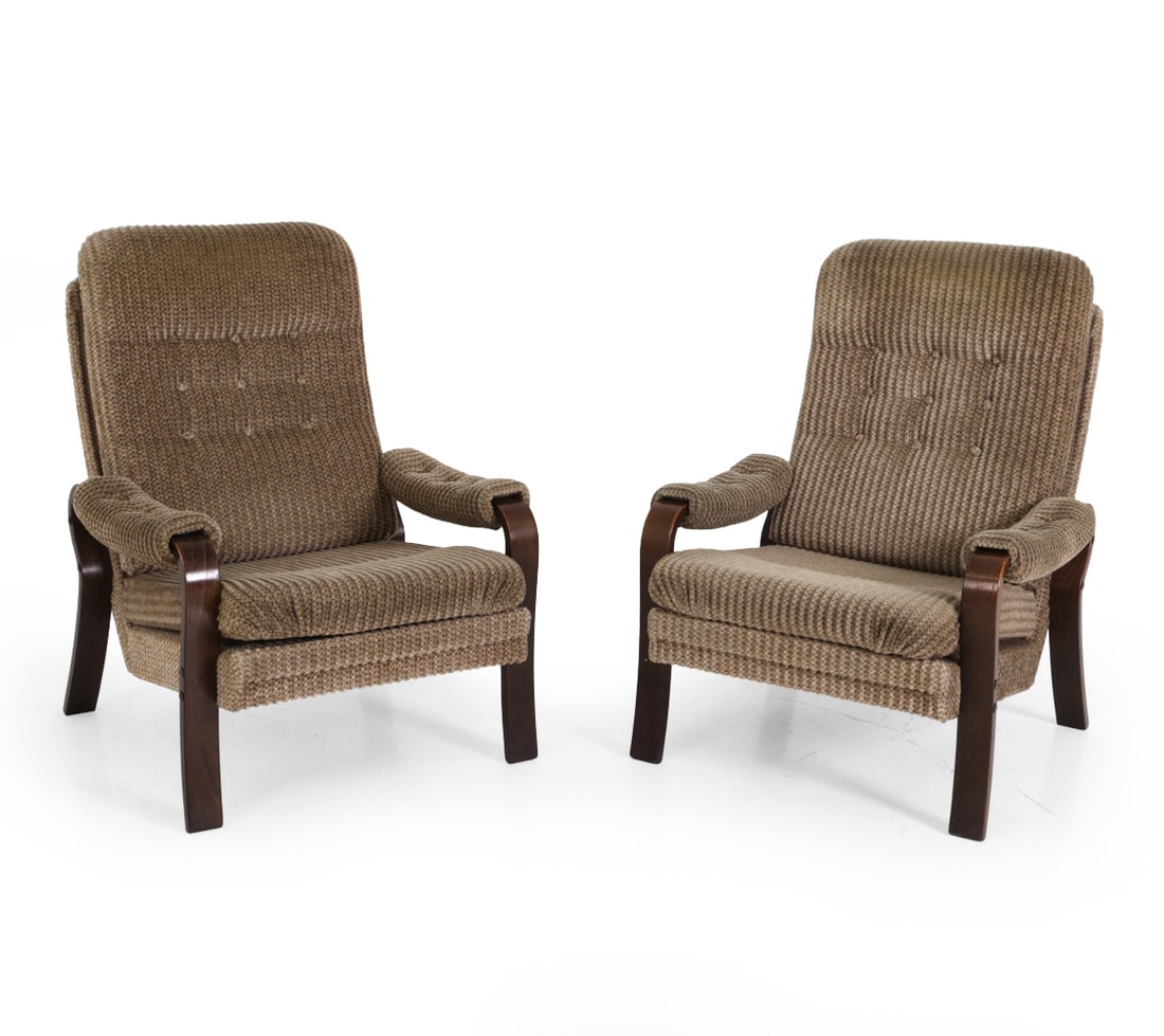 PAIR OF DANISH VELOUR LOUNGE CHAIRS C. 1970S: Stained beech frame with velour upholstery. Denmark, circa 1970s. Dimensions: H 33" x W 29.25" x D 26" x SH 16.25" Condition: Scuff and some small dents on wood. Upholstery is slightly frayed. Wear