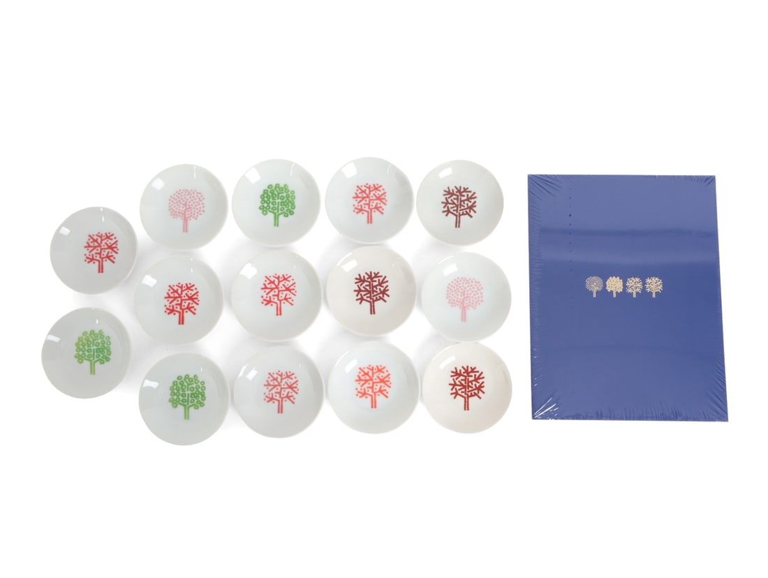 (14) FOUR SEASONS DISHES W/ AUCTION CATALOG & CARD: Designed by Emil Antonucci for the grand opening of The Four Seasons Restaurant in Manhattan in 1959. All marked underneath. Porcelain with multicolored and various tree motifs. Includes business