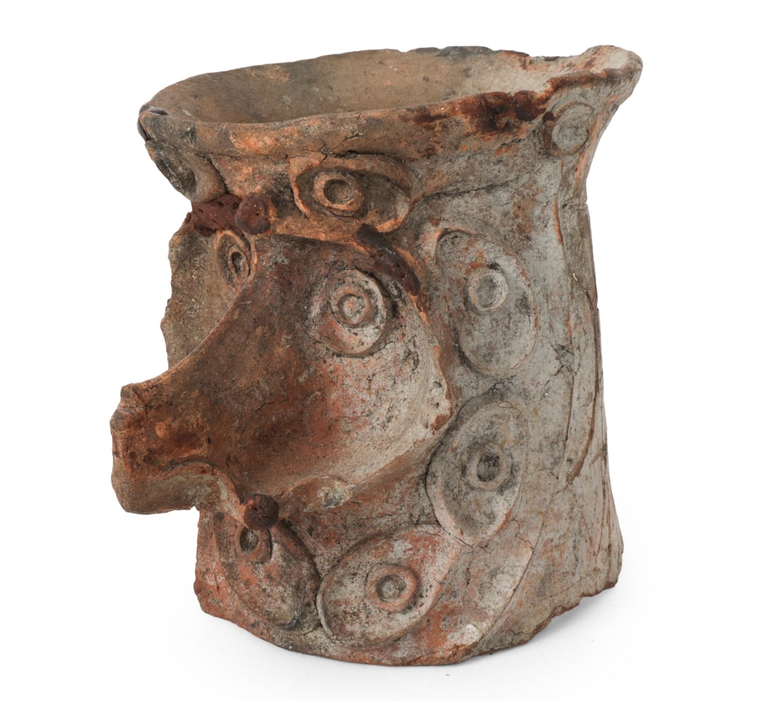 PRE COLUMBIAN TERRACOTTA EFFIGY CENSER: Pre Columbian terracotta effigy censer, depicting an anthropomorphic animal or deity head. Dimensions: H 9" x W 8" x D 10.5'' Condition: Minor scratches, patina, discoloration and scuffs. Wear