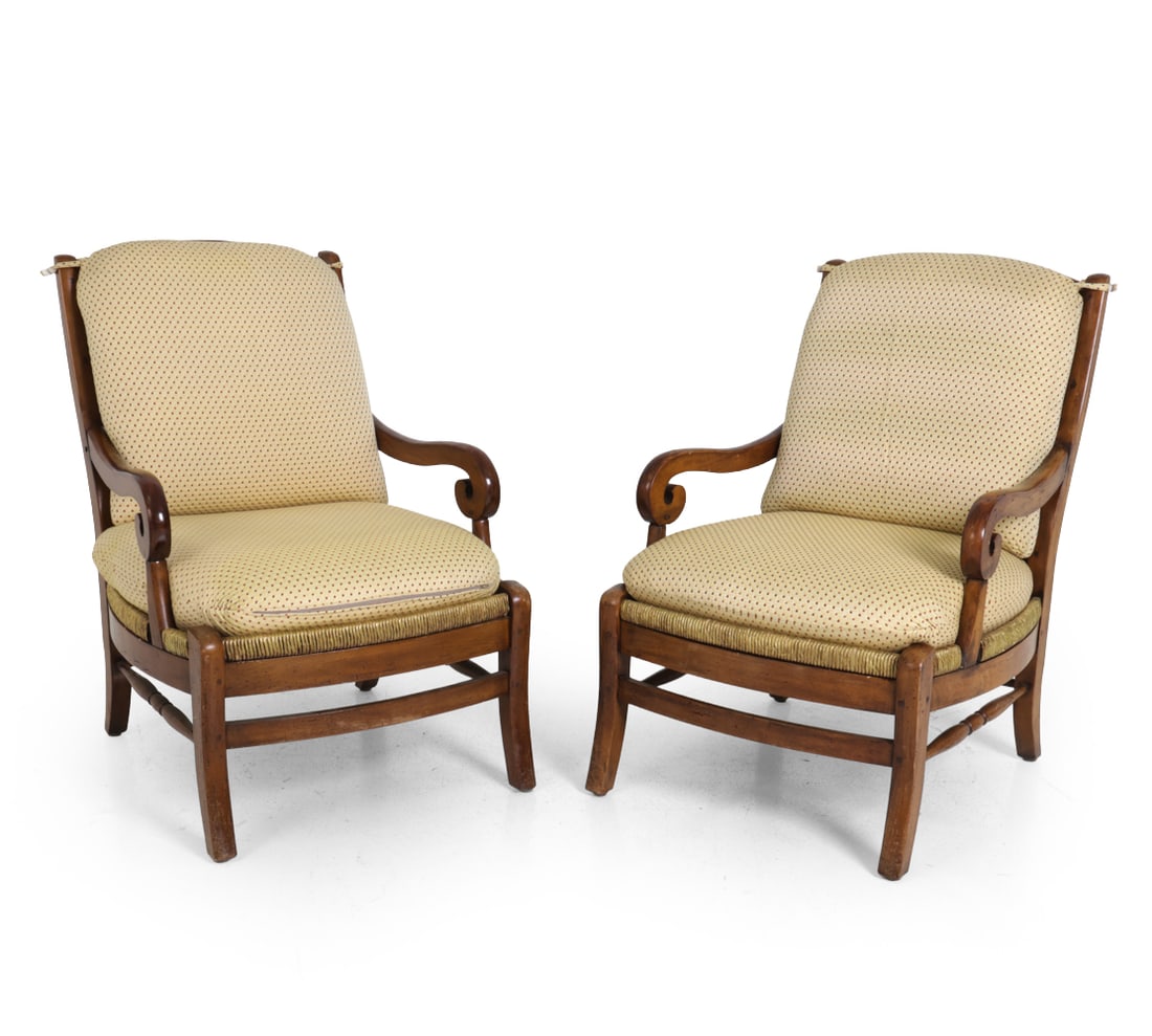 PAIR OF LUDWIK STYLE GERMAN BEECH LOUNGE CHAIRS: Beech frame with woven wicker side details. Germany, 20th century. Dimensions: H 34.5" x W 23.25" x D 24" x SH 13.25" Condition: Evidence of worming, not active. Scuffs, wear of finish, and