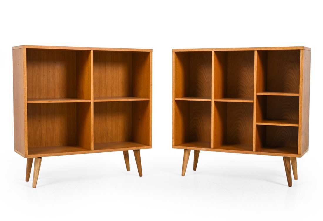 PAIR OF BJERRINGBRO DANISH OAK BOOKCASES C. 1960S: Labeled for A/S Bjerringbro Savvaerk on backsides. Adjustable shelves. Dimensions: H 36.5" x W 36.25" x D 12" Condition: Loss of finish, small losses, paint marks, spots of soiling, wear consistent wi