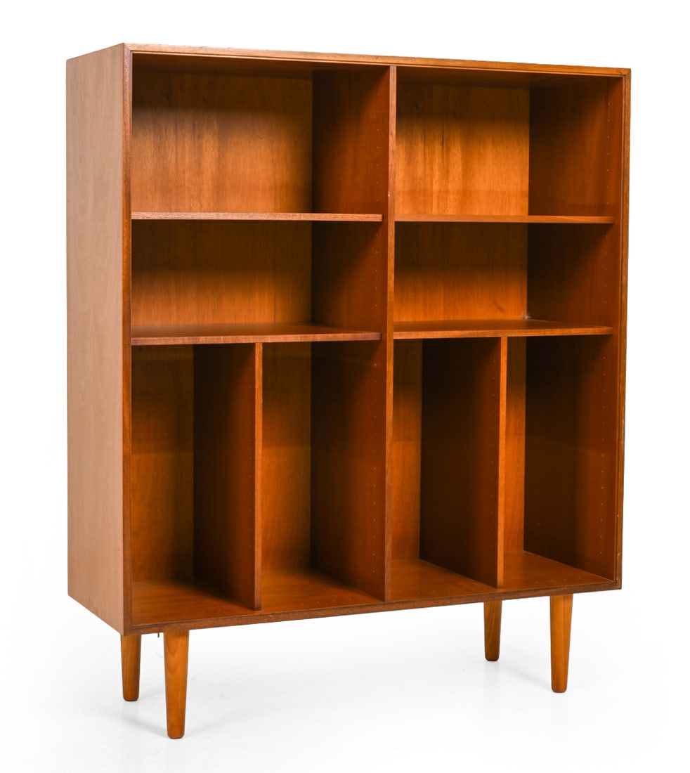 HUNDEVAD STYLE DANISH TEAK BOOKCASE C. 1960S: Teak with tapered legs and shelves. Denmark, circa 1960s. Dimensions: H 48" x W 40" x D 15" Condition: Sun Fading, Scuffs and nicks to top surface. Wear consistent with age and use L112