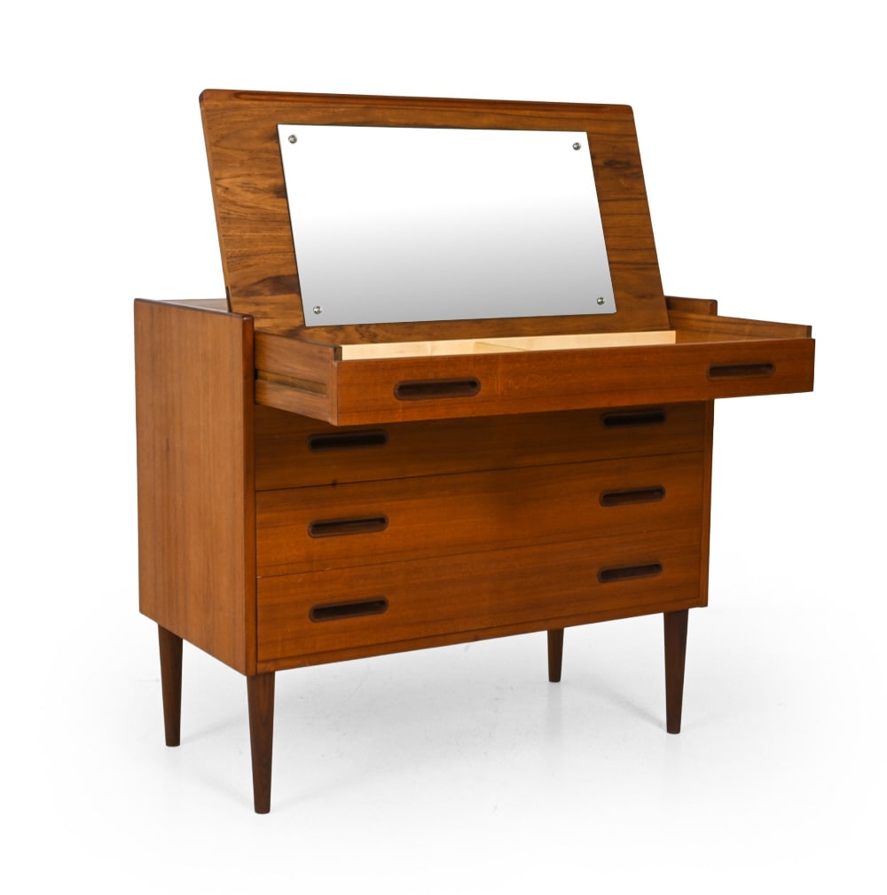 MID-CENTURY DANISH TEAK SECRETARY VANITY CHEST: Teak chest with a pull out top writing surface which can be flipped over to be a mirror. Denmark, Circa 1960s Dimensions: H 31" x W 35.5? x D 18.25? Condition: Fading and discoloration. Scuffs and din