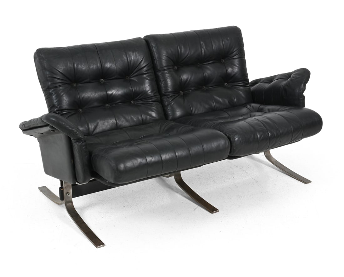 SOREN NISSEN AND EBBE GEHL ATLANTIS LEATHER SOFA: Metal base with black tufted leather upholstery. For Jeki Mobler. Apparently unmarked. Dimensions: H 29" x W 58" x D 32" x SH 16.5" Condition: Stains to underside, oxidation to base, cracks and small 