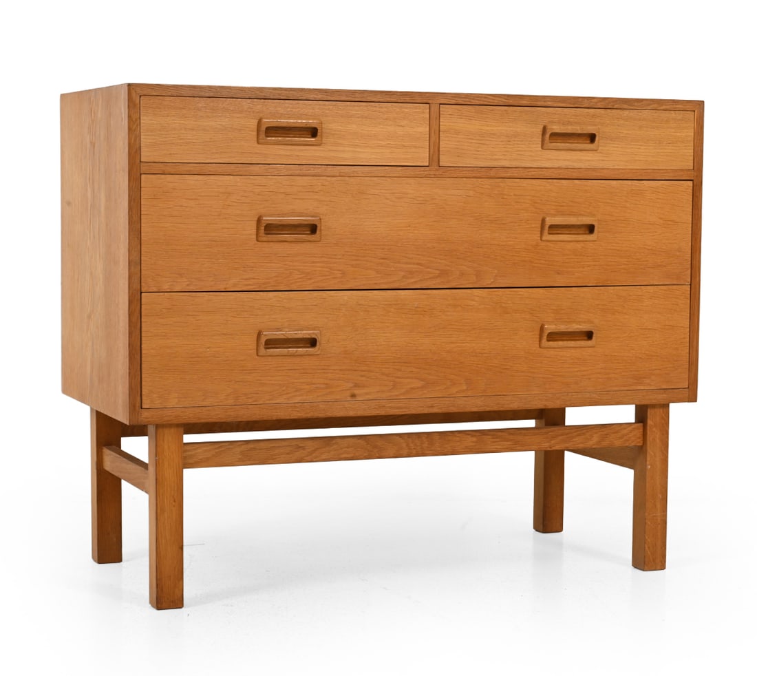 HOLGER JENSEN FOR FDB MOBLER OAK CHEST: Denmark. Circa 1960s Dimensions: H 29" x W 35.75" x D 16.75" Condition: Fading/discoloration, ding/loss to edge. Dings to feet. Wear consistent with age and use L090