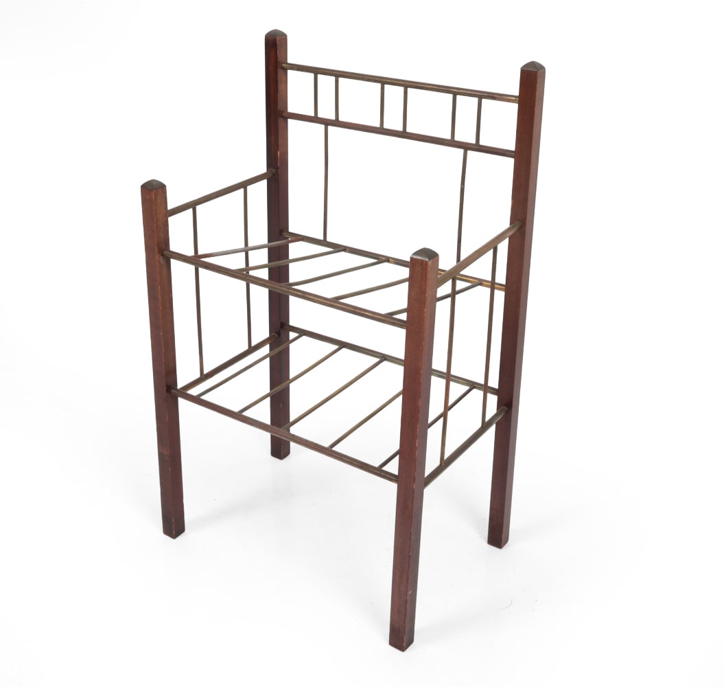 STYLE OF ERNST ROCKHAUSEN BRASS MAGAZINE RACK: Art Deco magazine stand in brass and stained beech featuring architectural racks. Germany, circa 1930s. Dimensions: H 28" x W 17.25? x D 11.75" Condition: Some wear to wooden frame. Patina to brass. B