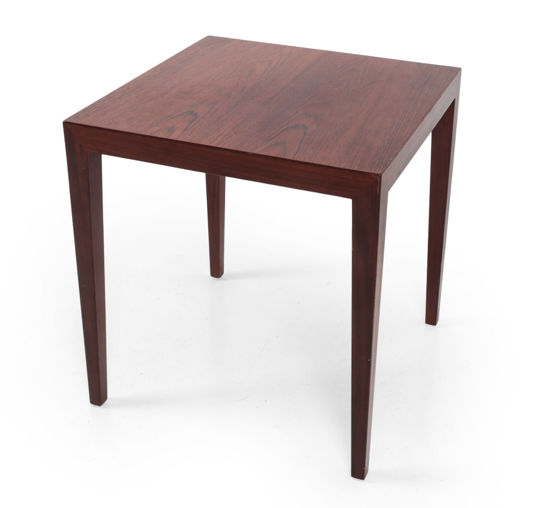 SEVERIN HANSEN FOR HASLEV ROSEWOOD SIDE TABLE: Rosewood side table. Marked underneath. Denmark. C. 1960s Dimensions: H 19.75" x W 18.5? x D 18.5? Condition: Some scratches and nicks, small loss to finish on top. Some sun fading, Wear consistent wi