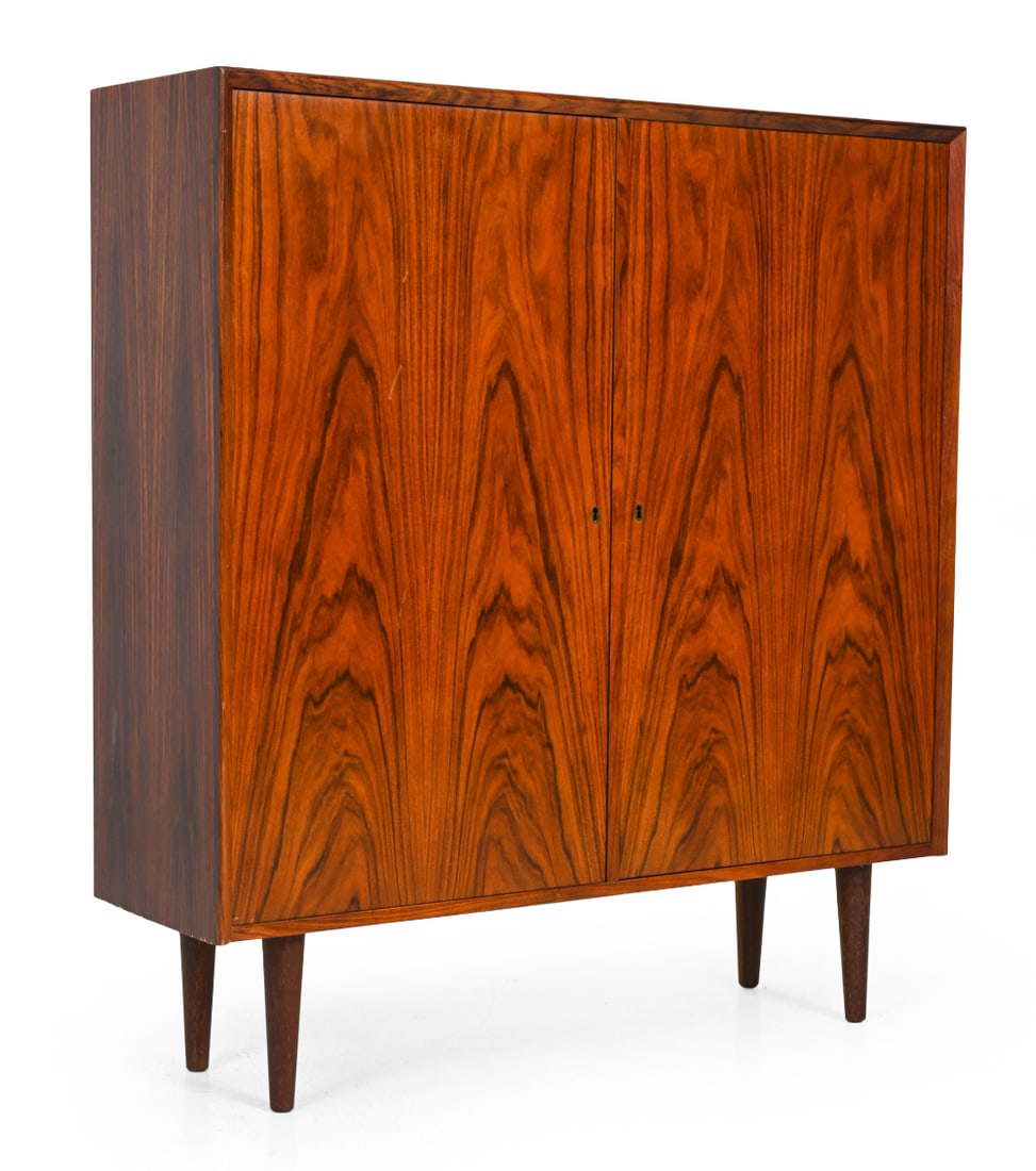 ATTR. ERIK BROUER DANISH ROSEWOOD CABINET C. 1960S: Key included. Rosewood cabinet with brass keyhole, black top and tapered legs. Apparently unmarked. Denmark, circa 1960s. Dimensions: H 43" x W 39.5? x D 11.5" Condition: Wear consistent with age and 